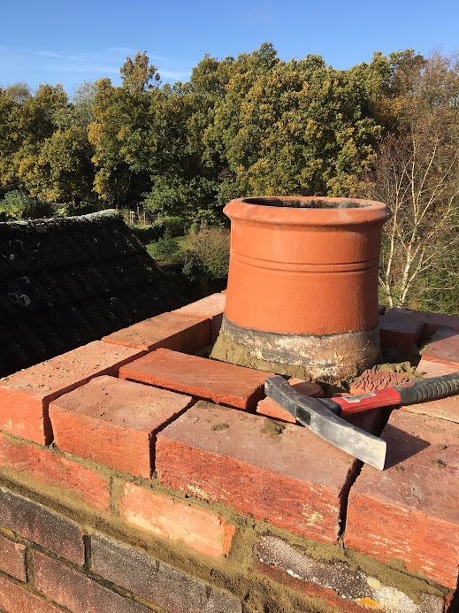 New chimney pot installed on a professionally repaired chimney stack in Hertfordshire.