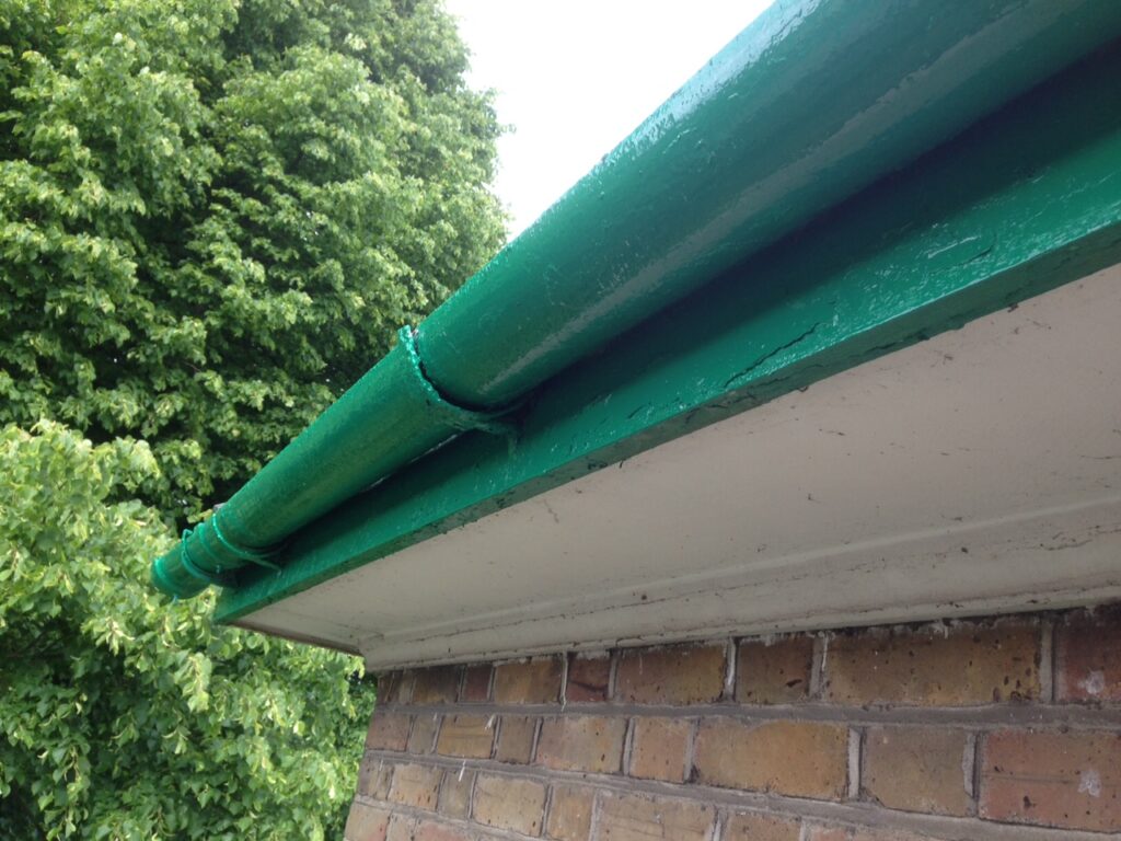 Freshly refurbished and repainted guttering after professional restoration by RidgeOak in Hertfordshire.