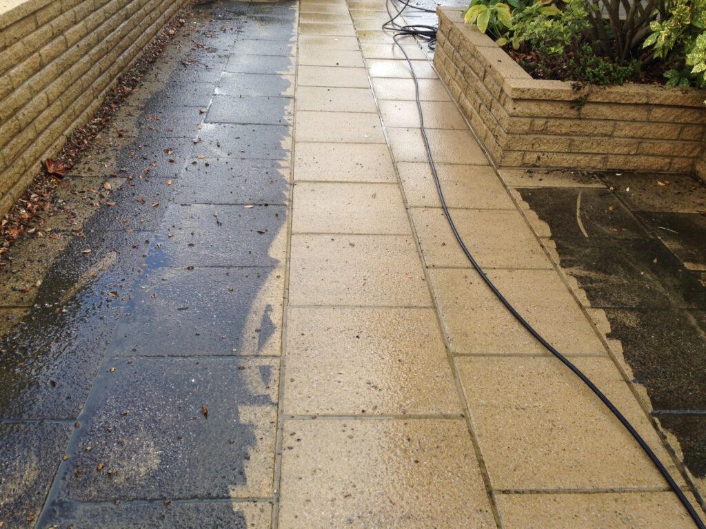 Professional jet washing service by RidgeOak restoring a driveway in Hertfordshire.